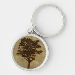 Porte-clés Silhouette d'arbre sur l'arrière - plan en bronze