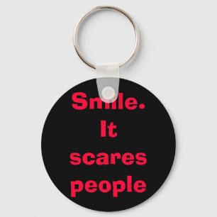 Porte-clés Souriez. Ça fait peur aux gens