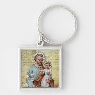 Porte-clés St Joseph avec le cru religieux de Jésus de bébé