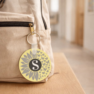 Porte-clés tournesol et papillon avec monogramme e