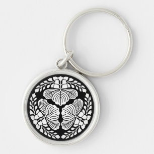 Porte-clés Trois paulownia fleurissent, têtes tournées vers l