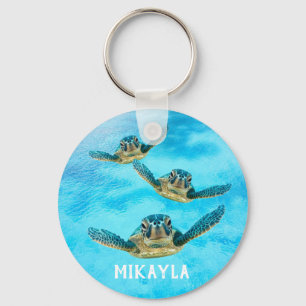 Porte-clés Trois tortues de mer de bébé nageant