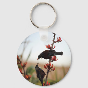 Porte-clés Tui birds sur le lin néo-zélandais
