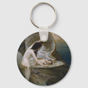 Porte-clés Un bébé aquatique retrouvé dans un coquillage par