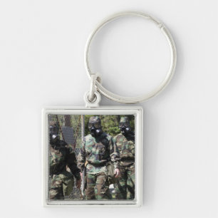 Porte-clés Un groupe de participants solaires de défi