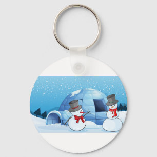 Porte-clés un igloo et des bonhommes de neige