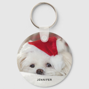 Porte-clés Un mignon chien blanc dans un Casquette de Noël ro