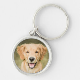 Porte-clés Un portrait d'un chiot de golden retriever