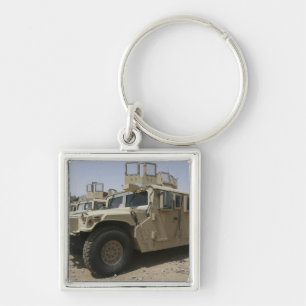 Porte-clés Une rangée des humvees des militaires Polic de