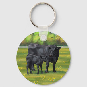 Porte-clés Vache d'Angus noir et veau mou en pâturage d'été