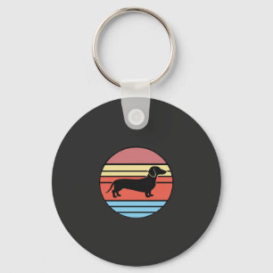 Porte-clés Vecteur de coucher de soleil rétro teckel
