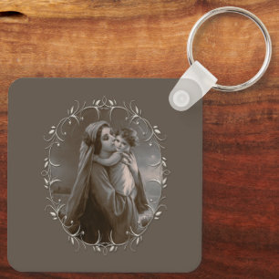 Porte-clés Vierge vintage et enfant avec cadre argenté