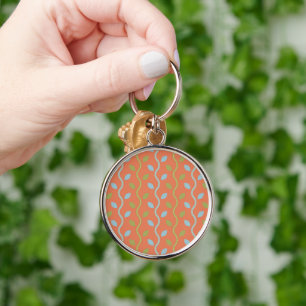 Porte-clés Vins bleus et verts rétro sur motif floral orange