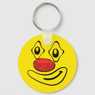 Porte-clés Visage maladroit de jaune de clown