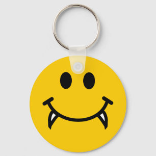 Porte-clés Visage souriant de vampire avec des crocs