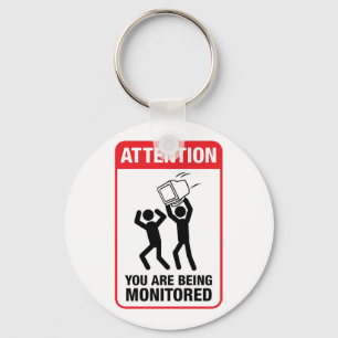 Porte-clés Vous êtes surveillés - humour de bureau