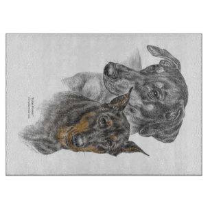 Portrait von zwei Dobermans Schneidebrett