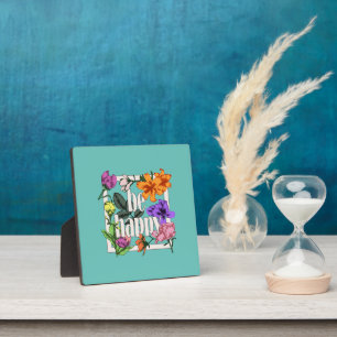 Positives Zitat Sei glücklich und Garten-Blume Fotoplatte