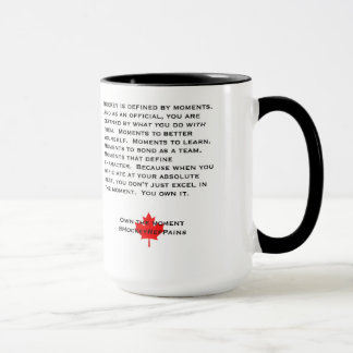 Posséder la tasse d'arbitre de moment