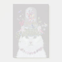 Chat blanc avec cloche papillon