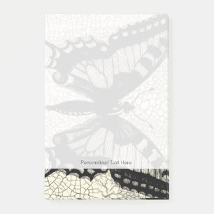 Post-it® Papillon noir et blanc sur l'arrière - plan criqué