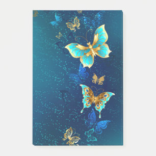 Post-it® Papillons d'or sur un Arrière - plan bleu