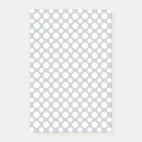 Pois blancs gros et petits sur bâtons gris