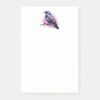 Un Corbeau noir sur une branche