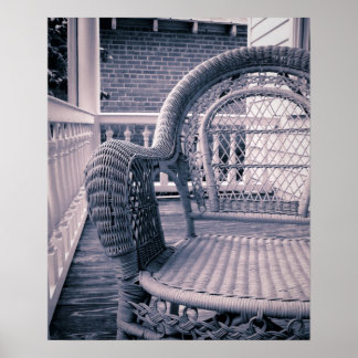 Poster Chaise en osier sur un porche du Sud