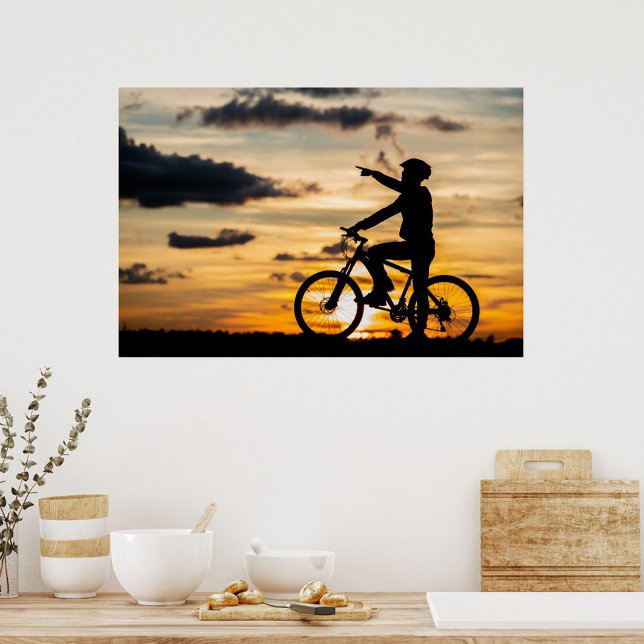 Poster cycliste (Silhouette of a man on a bicycle, wearing a helmet, pointing to the right, sunset background.)