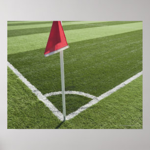 Poster Drapeau rouge du coin sur le terrain de football