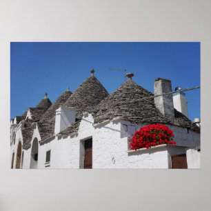 Poster Fleurs de géranium et maisons de trulli dans