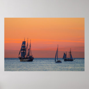 Poster Grand voilier marchand et coucher du soleil sur la