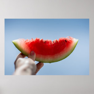Poster Holding sliced watermelon