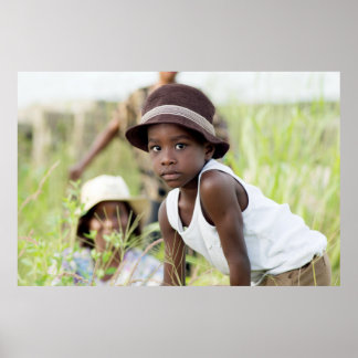 Poster Injured child in the grass.