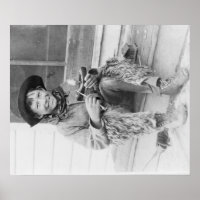 Jeune garçon habillé en cowboy avec jouets