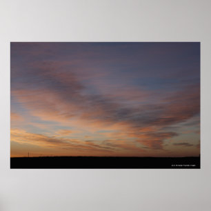 Poster Nuages dans un ciel orange au lever de soleil