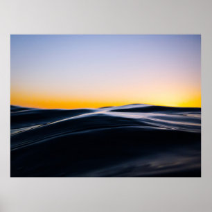 POSTER SABLE NOIR SOUS LE CIEL D'ORANGE PENDANT LE COUCHE
