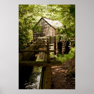 Poster sur la vieille usine et la roue d'eau