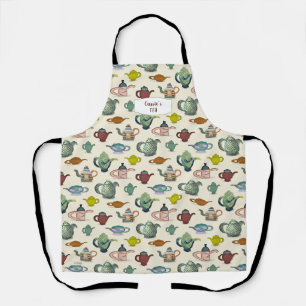 Pots de thé dans un joli tablier motif