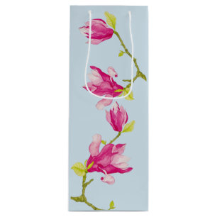 Pour Bouteille Tulip Magnolias sur un sac cadeau