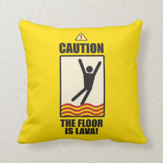 PRÉCAUTION. Le plancher est lave. un coussin