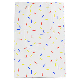 Primärfarben-Jimmy-Sprinklen-Geschenktasche Mittlere Geschenktüte