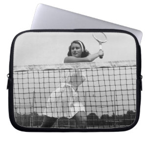 Protection Pour Ordinateur Portable Femme jouant au tennis