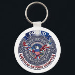 Proud American Air Force Daughter Schlüsselanhänger<br><div class="desc">This design features colorful American eagle with its wings widely spread. The eagle is located over the magic mandala and is decorated with the USA flag. The colorful text "Proud American Air Force Daughter" goes around the image. A beautiful family gift for a girl or woman. Do not forget to...</div>