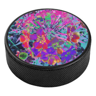 Psychedelisch farbige Rot- und Lila-Blumen Eishockey Puck