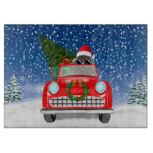 Pudel fährt Auto im Schnee Weihnachten Schneidebrett