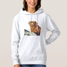 Chien assis devant un magazine