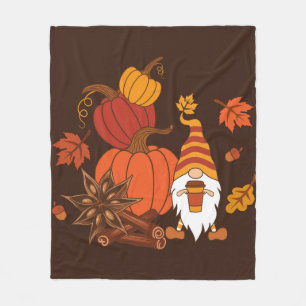 Pumpkins, star anise, cinnamon sticks, autumn leav fleecedecke