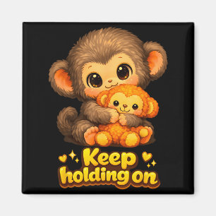 Punch-Affe mit Teddybär kuschelt und hält weiter f Magnet